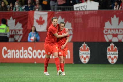 Apr 8, 2022; Vancouver, BC, Canada;  Women's Canadian National midfielder Jessie Fleming (17) celebrates her goal with forward Christine Sinclair (12) during the second half against Women's Nigeria National team at BC Place. Mandatory Credit: Anne-Marie Sorvin-USA TODAY Sports