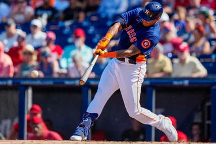 Mar 5, 2023; West Palm Beach, Florida, USA; Houston Astros right fielder Bligh Madris (66) hits a single against the Washington Nationals during the fifth inning at The Ballpark of the Palm Beaches. Mandatory Credit: Rich Storry-USA TODAY Sports