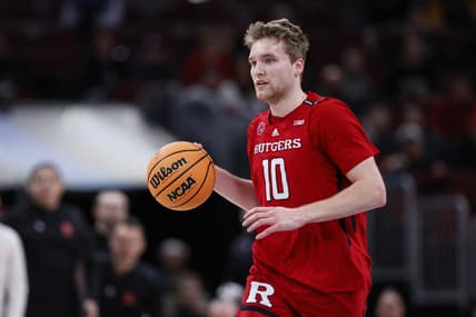 Mar 10, 2023; Chicago, IL, USA; Rutgers Scarlet Knights guard Cam Spencer (10) brings the ball up court against the Purdue Boilermakers during the first half at United Center. Mandatory Credit: Kamil Krzaczynski-USA TODAY Sports