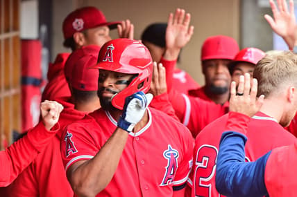Mar 21, 2023; Salt River Pima-Maricopa, Arizona, USA; Los Angeles Angels left fielder Jo Adell (7) celebrates with teammates after hitting a two run home run in the first inning against the Arizona Diamondbacks during a Spring Training game at Salt River Fields at Talking Stick. Mandatory Credit: Matt Kartozian-USA TODAY Sports