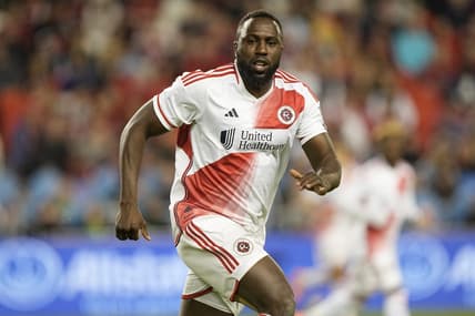 May 6, 2023; Toronto, Ontario, CAN; New England Revolution forward Jozy Altidore (14) runs downfield against Toronto FC during the second half at BMO Field. Mandatory Credit: John E. Sokolowski-USA TODAY Sports