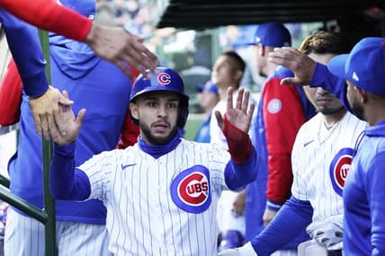 May 9, 2023; Chicago, Illinois, USA; Chicago Cubs infielder Nick Madrigal (1) is greeted in the dugout after scoring against the St. Louis Cardinals during the first inning at Wrigley Field. Mandatory Credit: David Banks-USA TODAY Sports