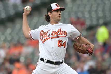 May 16, 2023; Baltimore, Maryland, USA;  Baltimore Orioles starting pitcher Dean Kremer (64) throws a first inning pitch against the Los Angeles Angels at Oriole Park at Camden Yards. Mandatory Credit: Tommy Gilligan-USA TODAY Sports