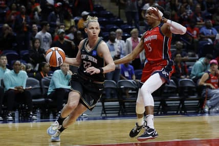 May 19, 2023; Washington, District of Columbia, USA; New York Liberty guard Courtney Vandersloot (22) drives to the basket as Washington Mystics guard Brittney Sykes (15) defends at Entertainment & Sports Arena. Mandatory Credit: Geoff Burke-USA TODAY Sports