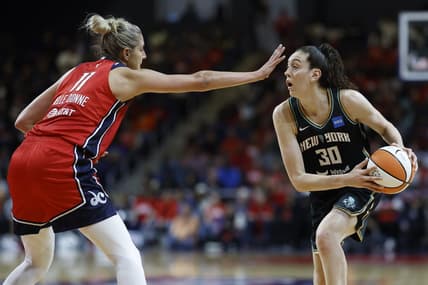 May 19, 2023; Washington, District of Columbia, USA; New York Liberty forward Breanna Stewart (30) holds the ball as Washington Mystics forward Elena Delle Donne (11) defends at Entertainment & Sports Arena. Mandatory Credit: Geoff Burke-USA TODAY Sports