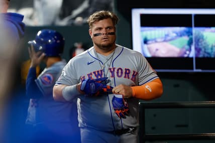 May 26, 2023; Denver, Colorado, USA; New York Mets designated hitter Daniel Vogelbach (32) in the dugout after striking out in the sixth inning against the Colorado Rockies at Coors Field. Mandatory Credit: Isaiah J. Downing-USA TODAY Sports