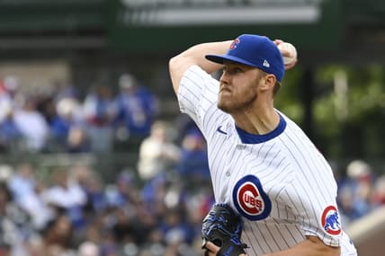 May 27, 2023; Chicago, Illinois, USA;  Chicago Cubs starting pitcher Jameson Taillon (50) delivers against the Cincinnati Reds during the first inning at Wrigley Field. Mandatory Credit: Matt Marton-USA TODAY Sports