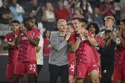 May 27, 2023; St. Louis, Missouri, USA; St. Louis CITY head caoch Bradley Carnell celebrates with team their victory at the end of the game at CITYPARK. Mandatory Credit: Scott Rovak-USA TODAY Sports