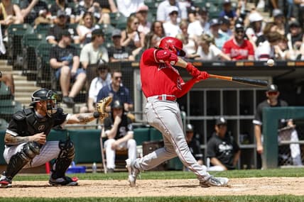 May 31, 2023; Chicago, Illinois, USA; Los Angeles Angels first baseman Jared Walsh (20) hits a two-run double against the Chicago White Sox during the third inning at Guaranteed Rate Field. Mandatory Credit: Kamil Krzaczynski-USA TODAY Sports