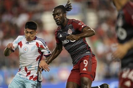 May 31, 2023; Toronto, Ontario, CAN; Toronto FC forward Charles Sapong (9) fights for the ball during the second half at BMO Field. Mandatory Credit: John E. Sokolowski-USA TODAY Sports