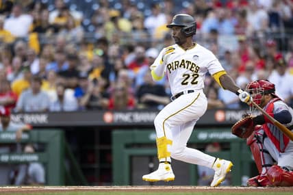 Jun 2, 2023; Pittsburgh, Pennsylvania, USA; Pittsburgh Pirates designated hitter Andrew McCutchen (22) hits a single against the St. Louis Cardinals during the first inning at PNC Park. Mandatory Credit: Scott Galvin-USA TODAY Sports