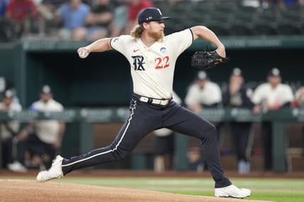 Jun 2, 2023; Arlington, Texas, USA; Texas Rangers starting pitcher Jon Gray (22) throws against the Seattle Mariners during the first inning at Globe Life Field. Mandatory Credit: Jim Cowsert-USA TODAY Sports