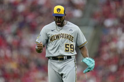 Jun 2, 2023; Cincinnati, Ohio, USA;  Milwaukee Brewers relief pitcher Elvis Peguero (59) celebrates after keeping the Reds scoreless in the 10th inning of the MLB National League game between the Cincinnati Reds and the Milwaukee Brewers at Great American Ball Park. The Brewers won 5-4 in 11 innings. Mandatory Credit: Sam Greene-USA TODAY Sports
