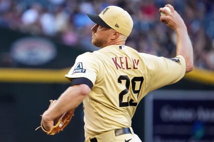 Jun 2, 2023; Phoenix, Arizona, USA; Arizona Diamondbacks starting pitcher Merrill Kelly (29) pitches against the Atlanta Braves during the first inning at Chase Field. Mandatory Credit: Joe Camporeale-USA TODAY Sports