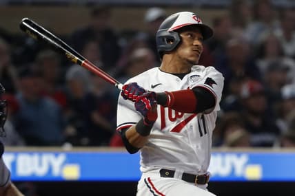 Jun 2, 2023; Minneapolis, Minnesota, USA; Minnesota Twins second baseman Jorge Polanco (11) hits an RBI double against the Cleveland Guardians in the seventh inning at Target Field. Mandatory Credit: Bruce Kluckhohn-USA TODAY Sports