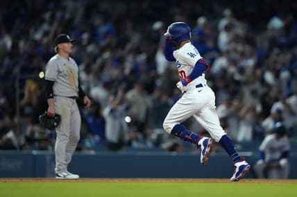 Jun 2, 2023; Los Angeles, California, USA; Los Angeles Dodgers right fielder Mookie Betts (50) rounds the bases after hitting a home run in the sixth inning against the New York Yankees  at Dodger Stadium. Mandatory Credit: Kirby Lee-USA TODAY Sports