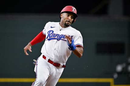 Jun 3, 2023; Arlington, Texas, USA; Texas Rangers second baseman Marcus Semien (2) scores against the Seattle Mariners during the second inning at Globe Life Field. Mandatory Credit: Jerome Miron-USA TODAY Sports