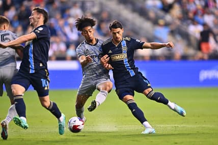 Jun 3, 2023; Philadelphia, Pennsylvania, USA; Philadelphia Union forward Julian Carranza (9) fights for the ball against CF Montreal midfielder Nathan-Dylan Saliba (19) during the first half at Subaru Park. Mandatory Credit: Kyle Ross-USA TODAY Sports