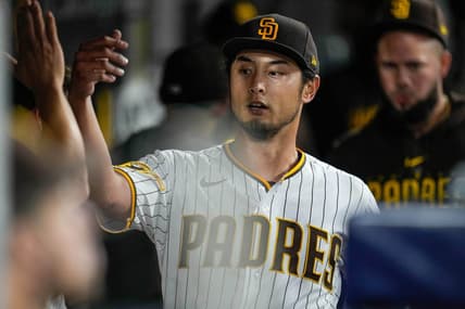 Jun 3, 2023; San Diego, California, USA;  San Diego Padres starting pitcher Yu Darvish (11) is greeted by teammates after the seventh inning against the Chicago Cubs at Petco Park. Mandatory Credit: Ray Acevedo-USA TODAY Sports