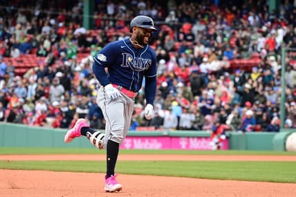 Jun 4, 2023; Boston, Massachusetts, USA; Tampa Bay Rays designated hitter Yandy Diaz (2) scores on his RBI single after a throwing error by the Boston Red Sox during the sixth inning at Fenway Park. Mandatory Credit: Eric Canha-USA TODAY Sports