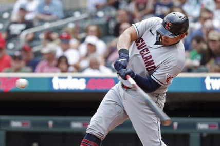 Jun 4, 2023; Minneapolis, Minnesota, USA; Cleveland Guardians designated hitter Josh Naylor (22) hits an RBI double against the Minnesota Twins in the seventh inning at Target Field. Mandatory Credit: Bruce Kluckhohn-USA TODAY Sports