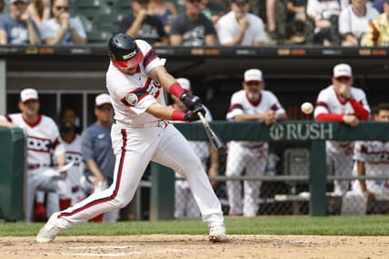 Jun 4, 2023; Chicago, Illinois, USA; Chicago White Sox third baseman Jake Burger (30) hits a grand slam walk-off against the Detroit Tigers during the ninth inning at Guaranteed Rate Field. Mandatory Credit: Kamil Krzaczynski-USA TODAY Sports