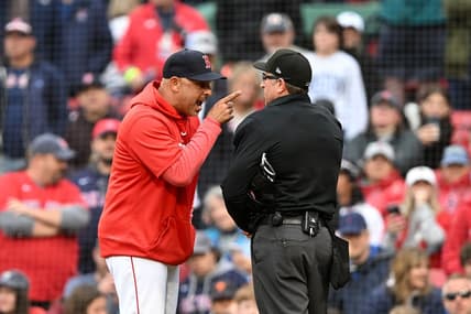 Jun 5, 2023; Boston, Massachusetts, USA; Boston Red Sox manager Alex Cora argues with umpire Chris Guccione (68) at the end of the eighth inning of a game against the Tampa Bay Rays at Fenway Park. Mandatory Credit: Brian Fluharty-USA TODAY Sports