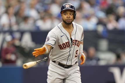 Jun 5, 2023; Toronto, Ontario, CAN; Houston Astros left fielder Corey Julks (9) tosses his bat after hitting a grand slam home run against the Toronto Blue Jays during the first inning at Rogers Centre. Mandatory Credit: John E. Sokolowski-USA TODAY Sports