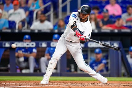Jun 5, 2023; Miami, Florida, USA; Miami Marlins second baseman Luis Arraez (3) hits a single against the Kansas City Royals during the fourth inning at loanDepot Park. Mandatory Credit: Rich Storry-USA TODAY Sports