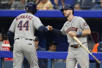 Jun 5, 2023; Toronto, Ontario, CAN; Houston Astros right fielder Kyle Tucker (30) congratulates designated hitter Yordan Alvarez (44) on his solo home run against the Toronto Blue Jays during the fourth inning at Rogers Centre. Mandatory Credit: John E. Sokolowski-USA TODAY Sports