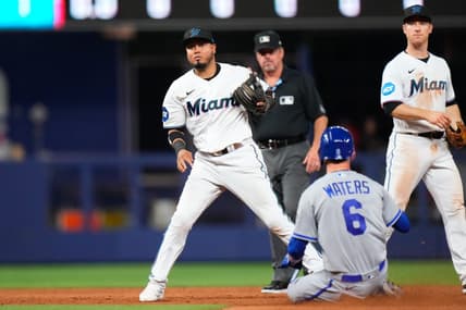 Jun 5, 2023; Miami, Florida, USA; Miami Marlins second baseman Luis Arraez (3) tags out Kansas City Royals center fielder Drew Waters (6) during the ninth inning at loanDepot Park. Mandatory Credit: Rich Storry-USA TODAY Sports