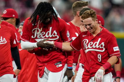 Cincinnati Reds third baseman Elly De La Cruz (44) shakes hands with shortstop Matt McLain (9) as the celebrate McLain   s walk-off single in the ninth inning of the MLB National League game between the Cincinnati Reds and the LA Dodgers at Great American Ball Park in downtown Cincinnati on Tuesday, June 6, 2023. The Reds won 9-8 on a walk-off, bases loaded, single off the bat of shortstop Matt McLain (9) in the bottom of the ninth.