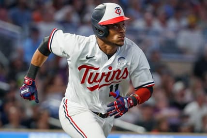 Jun 2, 2023; Minneapolis, Minnesota, USA; Minnesota Twins second baseman Jorge Polanco (11) hits an RBI double against the Cleveland Guardians in the seventh inning at Target Field. Mandatory Credit: Bruce Kluckhohn-USA TODAY Sports