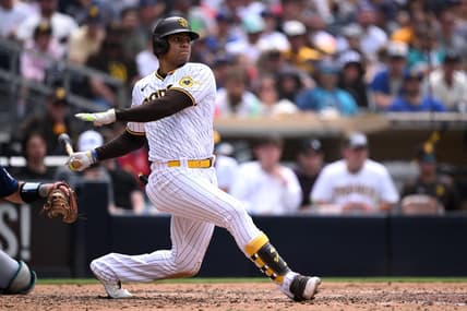 Jun 7, 2023; San Diego, California, USA; San Diego Padres left fielder Juan Soto (22) hits a two-RBI single against the Seattle Mariners during the fifth inning at Petco Park. Mandatory Credit: Orlando Ramirez-USA TODAY Sports
