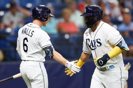 Jun 7, 2023; St. Petersburg, Florida, USA;  Tampa Bay Rays second baseman Taylor Walls (6) congratulates third baseman Isaac Paredes (17) after hitting a solo home run against the Los Minnesota Twins in the second inning at Tropicana Field. Mandatory Credit: Nathan Ray Seebeck-USA TODAY Sports