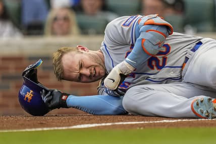 Jun 7, 2023; Cumberland, Georgia, USA; New York Mets first baseman Pete Alonso (20) reacts after being hit by a pitch against the Atlanta Braves during the first inning at Truist Park. Mandatory Credit: Dale Zanine-USA TODAY Sports