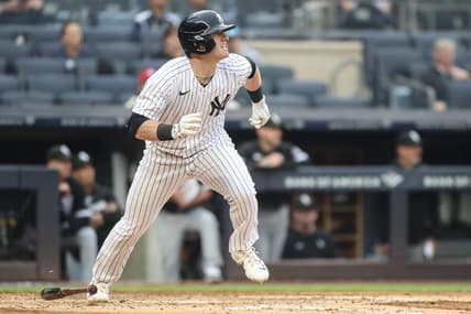 Jun 8, 2023; Bronx, New York, USA; New York Yankees center fielder Billy McKinney (57) hits a triple in the second inning against the Chicago White Sox at Yankee Stadium. Mandatory Credit: Wendell Cruz-USA TODAY Sports