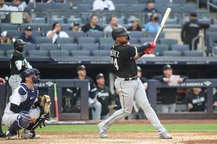 Jun 8, 2023; Bronx, New York, USA;  Chicago White Sox right fielder Eloy Jimenez (74) hits a two run home run in the seventh inning against the New York Yankees at Yankee Stadium. Mandatory Credit: Wendell Cruz-USA TODAY Sports