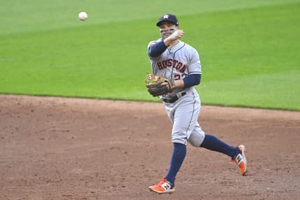 Jun 9, 2023; Cleveland, Ohio, USA; Houston Astros second baseman Jose Altuve (27) throws to first base in the third inning against the Cleveland Guardians at Progressive Field. Mandatory Credit: David Richard-USA TODAY Sports