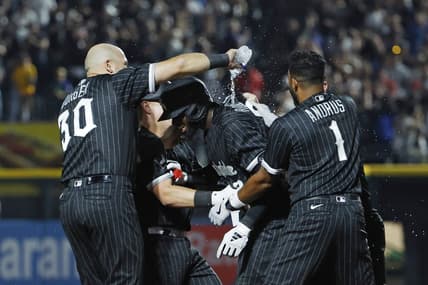 Jun 9, 2023; Chicago, Illinois, USA; Chicago White Sox center fielder Luis Robert Jr. (center) celebrates with teammates after hitting a walk-off single against the Miami Marlins during the ninth inning at Guaranteed Rate Field. Mandatory Credit: Kamil Krzaczynski-USA TODAY Sports