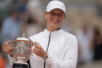 Jun 10, 2023; Paris,France; Iga Swiatek (POL) poses with the trophy after defeating Karolina Muchova (CZE) on day 14 at Stade Roland-Garros. Mandatory Credit: Susan Mullane-USA TODAY Sports