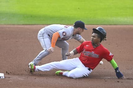 Jun 10, 2023; Cleveland, Ohio, USA; Cleveland Guardians third baseman Jose Ramirez (11) slides safely to third base beside Houston Astros third baseman Alex Bregman (2) in the first inning at Progressive Field. Mandatory Credit: David Richard-USA TODAY Sports