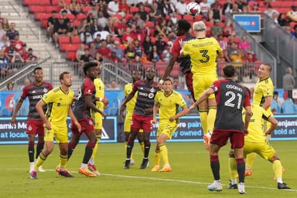 Jun 10, 2023; Toronto, Ontario, CAN;Nashville SC defender Lukas MacNaughton (3) jumps for the header  at BMO Field. Mandatory Credit: Nick Turchiaro-USA TODAY Sports