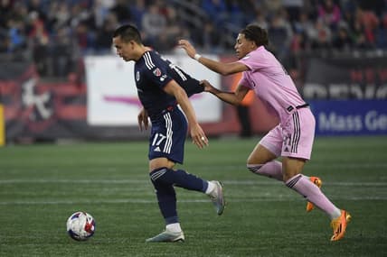 Jun 10, 2023; Foxborough, Massachusetts, USA; New England Revolution forward Bobby Wood (17) runs with the ball ahead of Inter Miami midfielder David Ruiz (41) during the first half at Gillette Stadium. Mandatory Credit: Bob DeChiara-USA TODAY Sports
