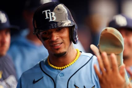 Jun 11, 2023; St. Petersburg, Florida, USA;  Tampa Bay Rays shortstop Wander Franco (5) celebrates in the dugout after scoring a run against the Texas Rangers in the first inning at Tropicana Field. Mandatory Credit: Nathan Ray Seebeck-USA TODAY Sports