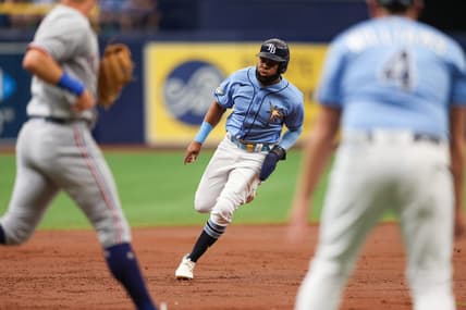 Jun 11, 2023; St. Petersburg, Florida, USA;  Tampa Bay Rays right fielder Manuel Margot (13) rounds third base to score a run against the Texas Rangers in the second inning at Tropicana Field. Mandatory Credit: Nathan Ray Seebeck-USA TODAY Sports