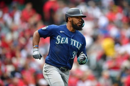 June 11, 2023; Anaheim, California, USA; Seattle Mariners right fielder Teoscar Hernandez (35) runs after hitting a single against the Los Angeles Angels during the sixth inning at Angel Stadium. Mandatory Credit: Gary A. Vasquez-USA TODAY Sports