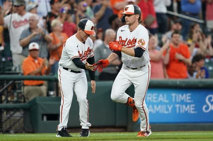 Jun 13, 2023; Baltimore, Maryland, USA; Baltimore Orioles designated hitter Gunnar Henderson (2) is greeted by coach Tony Mansolino (36) following his third inning grand slam against the Toronto Blue Jays at Oriole Park at Camden Yards. Mandatory Credit: Mitch Stringer-USA TODAY Sports