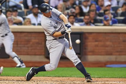 Jun 13, 2023; New York City, New York, USA; New York Yankees third baseman DJ LeMahieu (26) hits a two run home run during the fourth inning against the New York Mets at Citi Field. Mandatory Credit: Vincent Carchietta-USA TODAY Sports