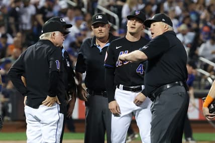 Jun 13, 2023; New York City, New York, USA; New York Mets relief pitcher Drew Smith (40) is ejected by umpire Bill Miller (26) during the seventh inning against the New York Yankees at Citi Field. Mandatory Credit: Vincent Carchietta-USA TODAY Sports